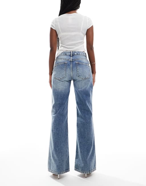 ASOS DESIGN loose flare jeans in light mid blue