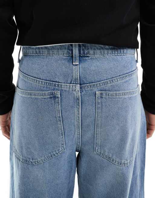ASOS DESIGN loose jeans in light wash blue, 4 of 5