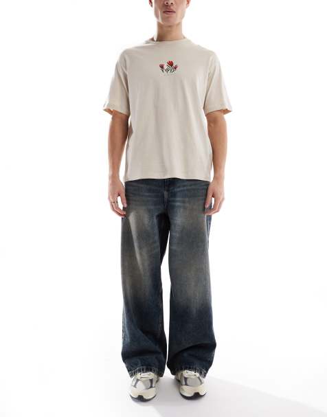 ASOS DESIGN loose jeans in mid wash blue - view 1