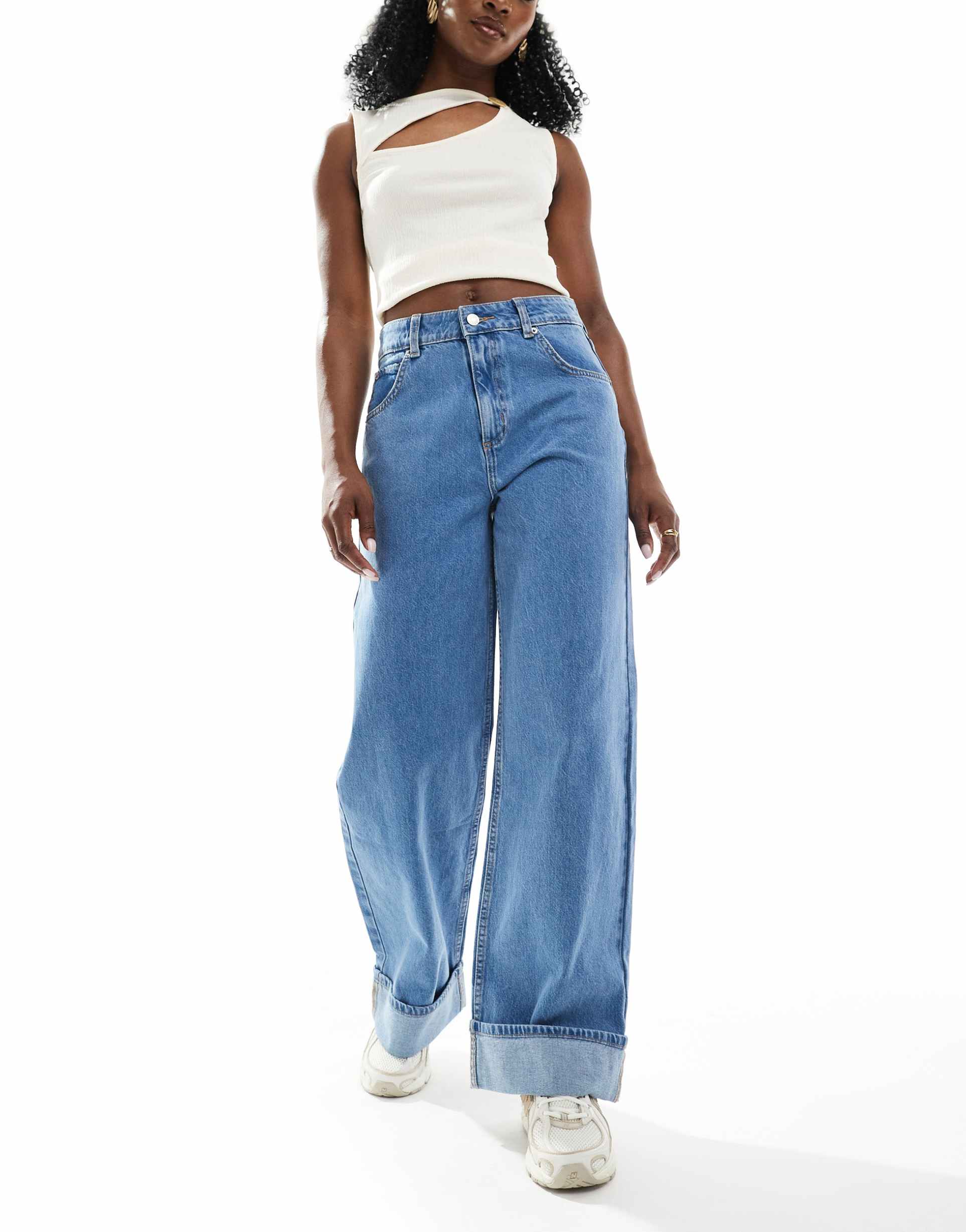 asos design loose jeans with deep turn up cuff in clean mid blue