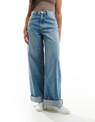 loose jeans with deep turn up cuff in vintage mid blue