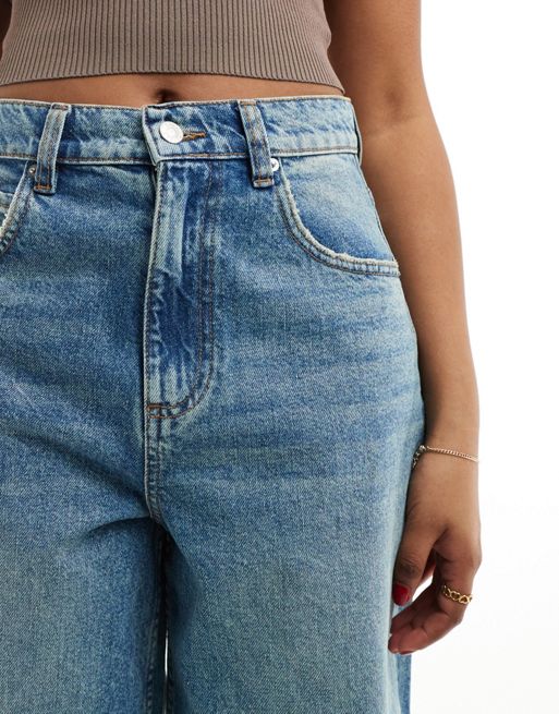 ASOS DESIGN loose jeans with deep turn up in tinted mid blue