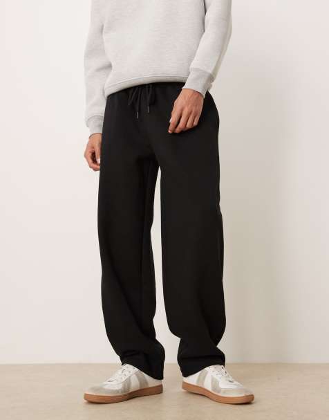 ASOS DESIGN loose joggers in black