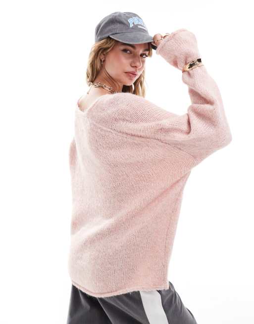 ASOS DESIGN loose knit oversized v neck jumper in pink