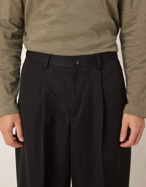 ASOS DESIGN loose leg pleated dress pants with exposed button in black, 4 of 5