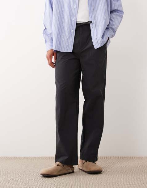 ASOS DESIGN loose straight elasticated trouser with pleat in black - view 1