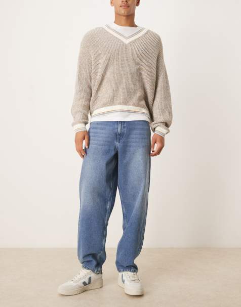 ASOS DESIGN loose straight fit jeans in midwash blue with raw hem styling - view 1