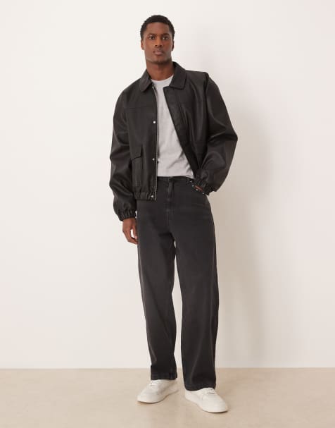 ASOS DESIGN loose straight fit jeans with stud detail in black wash