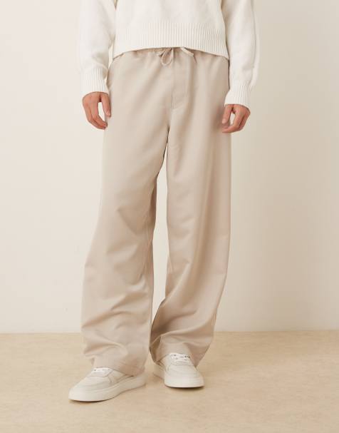 ASOS DESIGN loose straight fit trousers with elasticated waist in sand - view 1