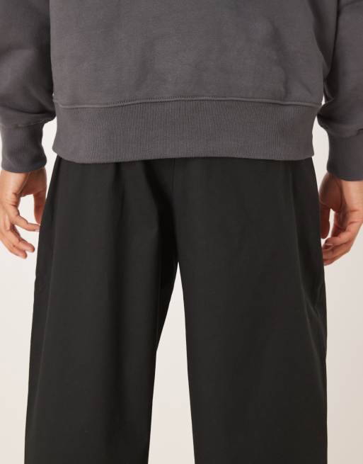 ASOS DESIGN loose straight leg pants in black with belt
