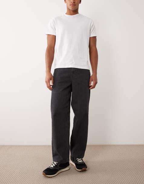 ASOS DESIGN loose straight textured jeans in washed black - view 1