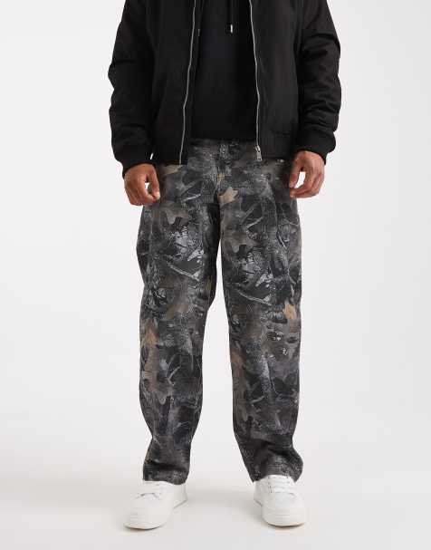 ASOS DESIGN loose straight trousers in camo - view 1