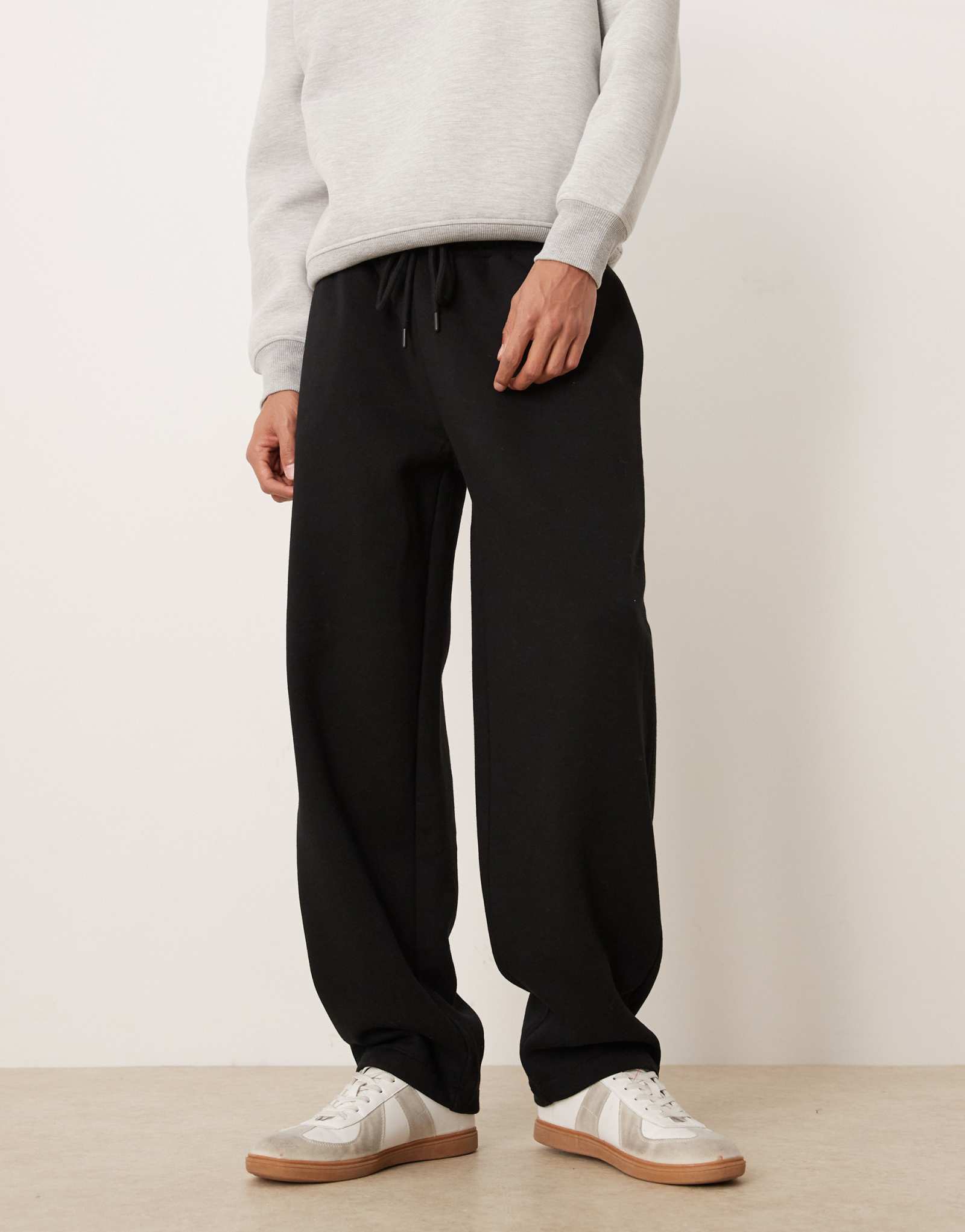 Свободные спортивные брюки ASOS DESIGN черного цвета