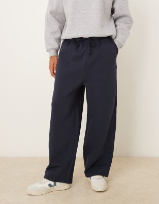 ASOS DESIGN loose sweatpants in navy