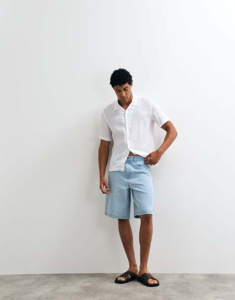 ASOS DESIGN loose textured denim jorts in light wash blue - view 1