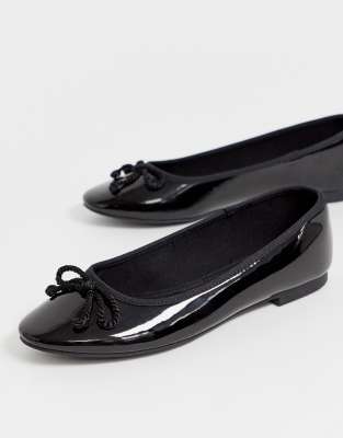 black flat shoes with bow