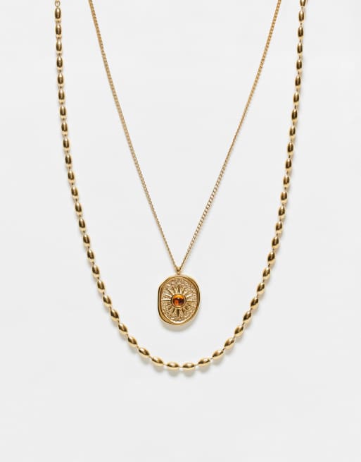 ASOS DESIGN - Lot de 2 colliers à chaîne boule en argent inoxydable étanche avec pendentif soleil ovale - Doré