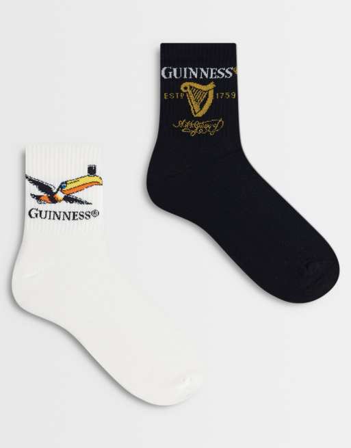 ASOS DESIGN - Lot de 2 paires de chaussettes avec motif Guinness - Multicolore