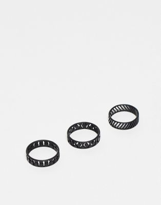 ASOS DESIGN 3 pack band ring set in cut out with cross design in matte black tone - ASOS Price Checker