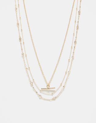 ASOS DESIGN - Lot de 3 colliers avec étoile et barre en T - Doré