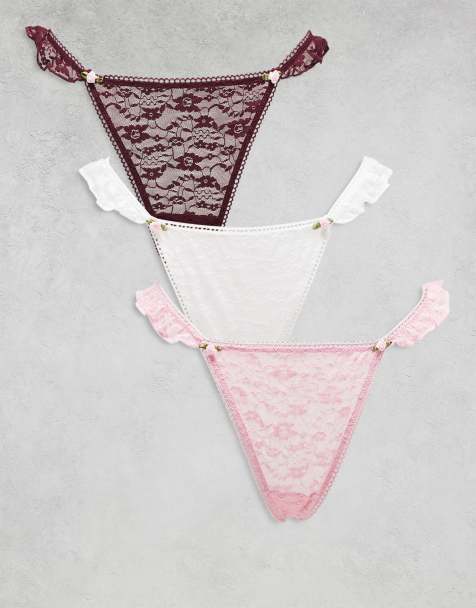ASOS DESIGN - Lot de 3 strings en dentelle avec volants sur le côté et boutons de rose - Rose, blanc et chocolat - view 1