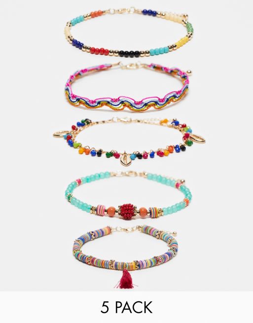 ASOS DESIGN - Lot de 5 bracelets de cheville avec perles multicolores, pampilles et coquillages - Doré
