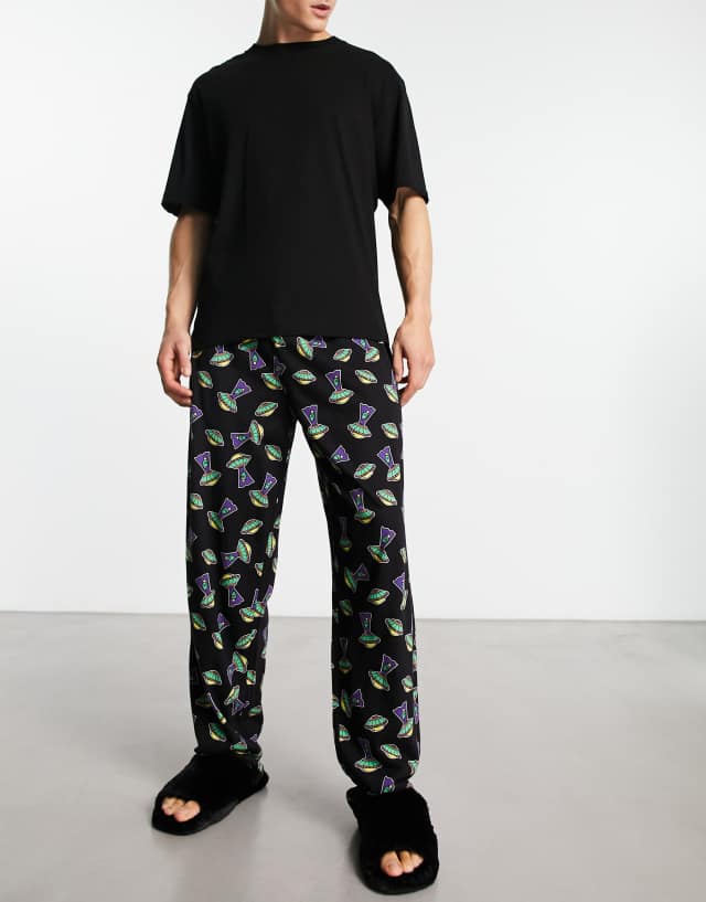 ASOS DESIGN lounge bottom in black with ufo print