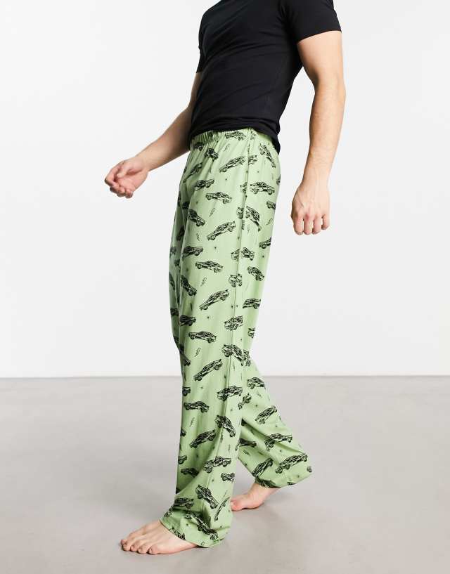 ASOS DESIGN lounge bottom in green with cars print