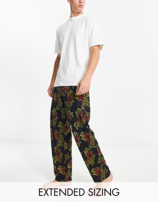 ASOS DESIGN lounge bottom in black with fire pizza print - ASOS Price Checker