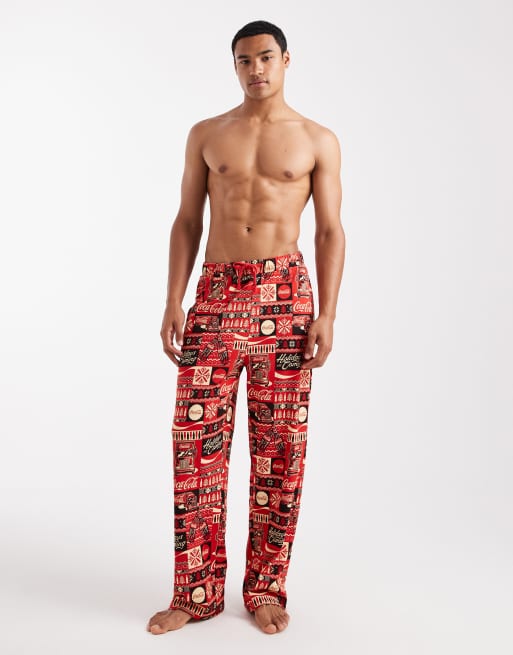 ASOS DESIGN lounge bottoms with Christmas Coca Cola graphic in red
