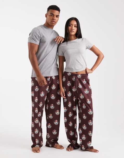 ASOS DESIGN lounge bottoms with Disney's Christmas Mickey Mouse graphic in burgundy - view 1