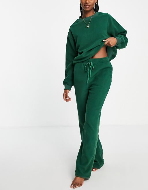 ASOS DESIGN flared sweatpants in forest green