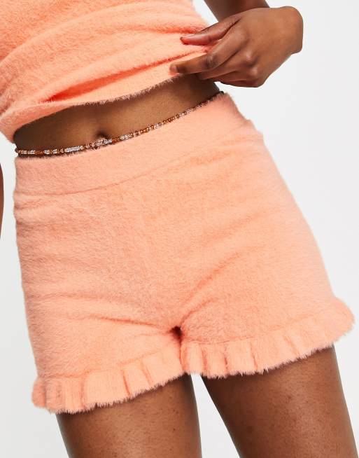 ASOS DESIGN lounge mix match knitted fluffy shorts in tangerine