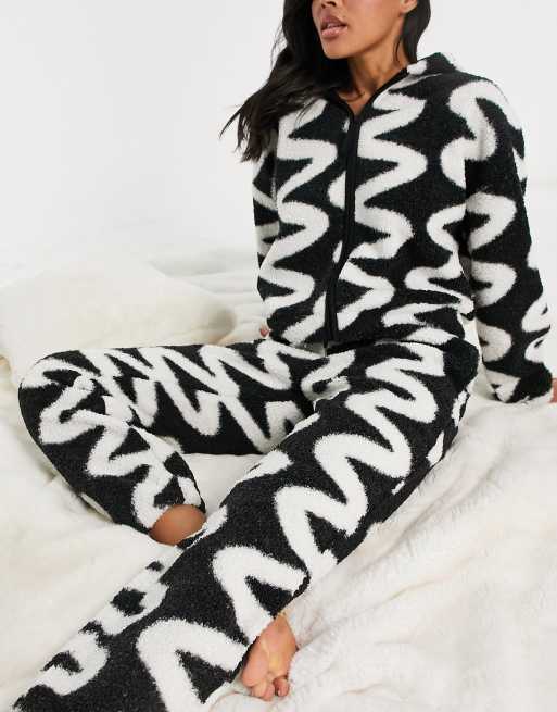 ASOS DESIGN lounge mix & match scribble print borg trackies in black