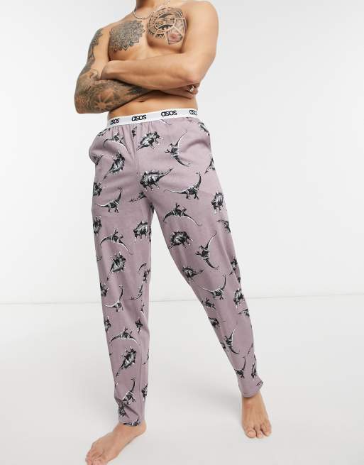 ASOS DESIGN lounge pants with dinosaur print in pink