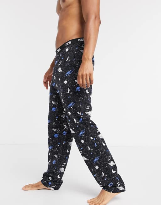 ASOS DESIGN lounge pyjama bottoms with hand drawn space print and branded waistband