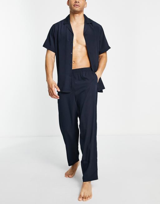 ASOS DESIGN - Lounge pyjamaset met overhemd en broek van kreukelstof