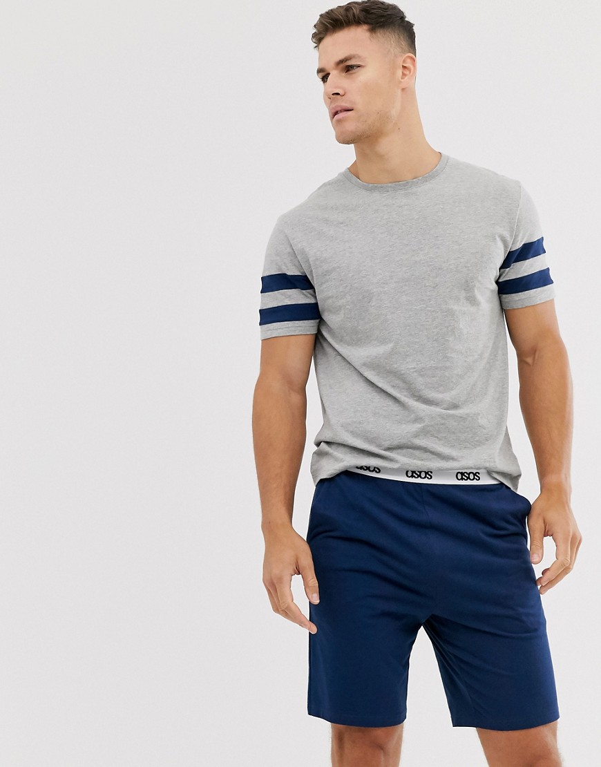 ASOS DESIGN - Lounge - Pyjamaset van short en T-shirt met strepen en tailleband met logo in marineblauw