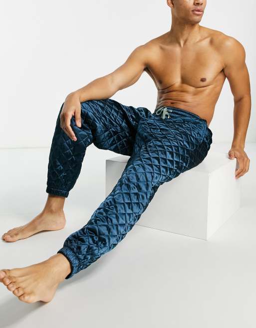 ASOS DESIGN lounge quilted satin trackies in blue
