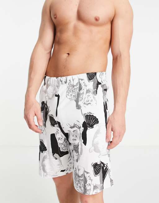 ASOS DESIGN – Lounge-Shorts mit vollflächigem Römer-Print
