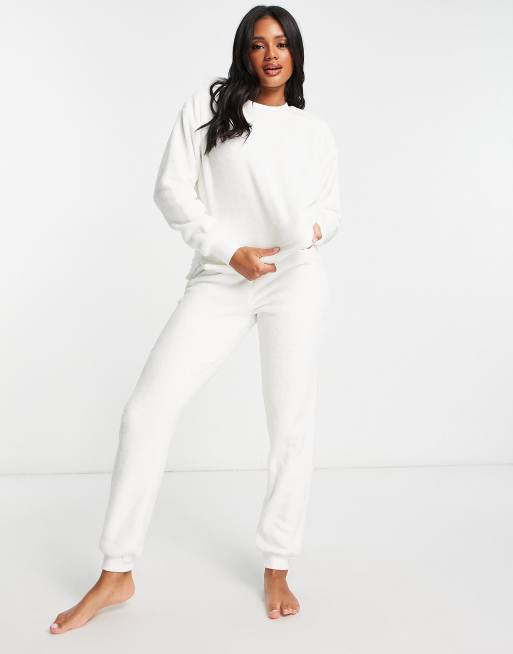 white sweatpants and sweatshirt set