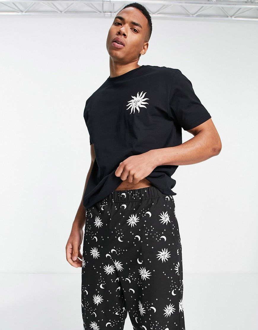 ASOS DESIGN lounge t-shirt and pants pajama set with celestial print in black