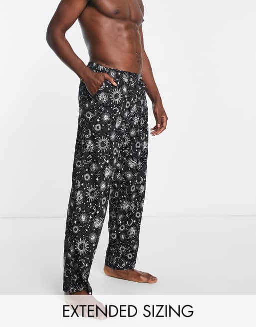 ASOS DESIGN - Loungebroek in zwart met hemelse print