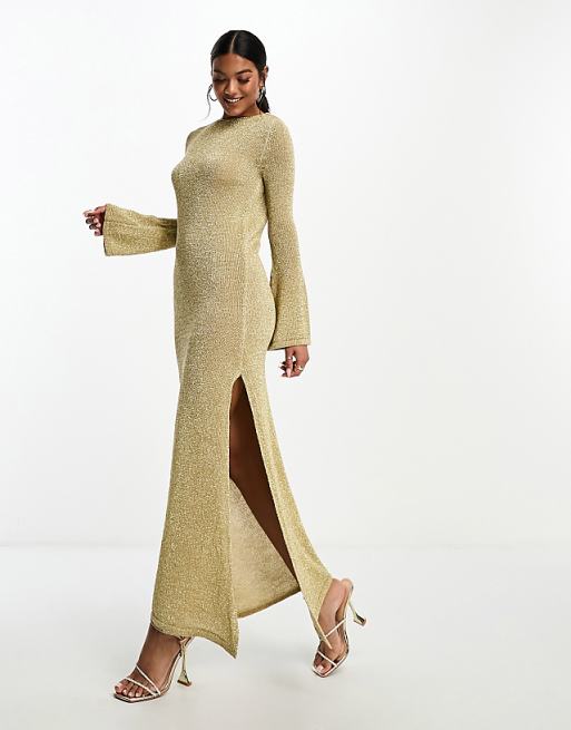 gold metallic knitted dress PIERRE CARDIN The deep plunge neckline adds a bold touch Dagmar Metallic knit dress