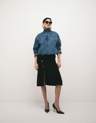 ASOS DESIGN low rise awkward length bouclé skirt in black