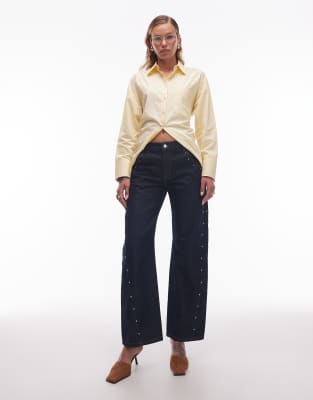 low rise barrel leg studded jeans in indigo-Blue