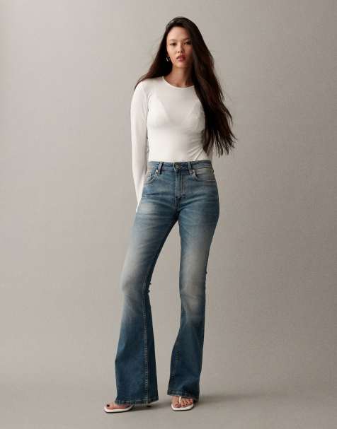 ASOS DESIGN bootcut flare jeans in midwash