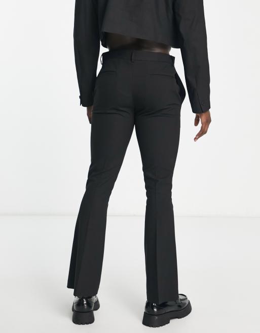 ASOS DESIGN low rise flare pants with strap detail and ruched waist in black  - ShopStyle Wide-Leg Trousers