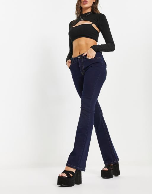 ASOS DESIGN Tall flared jeans in dark blue