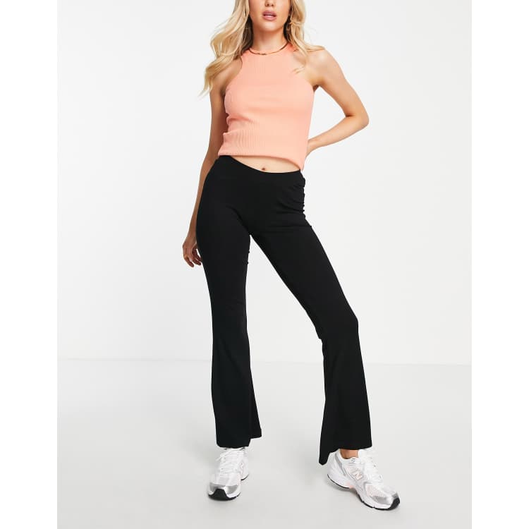 ASOS DESIGN low rise flare pants with strap detail and ruched waist in black